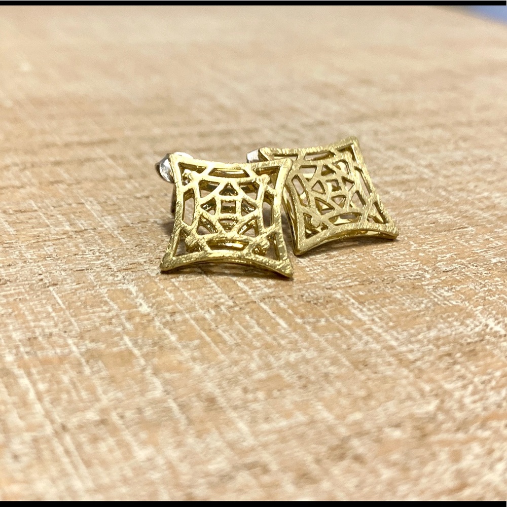 square gold designed earrings